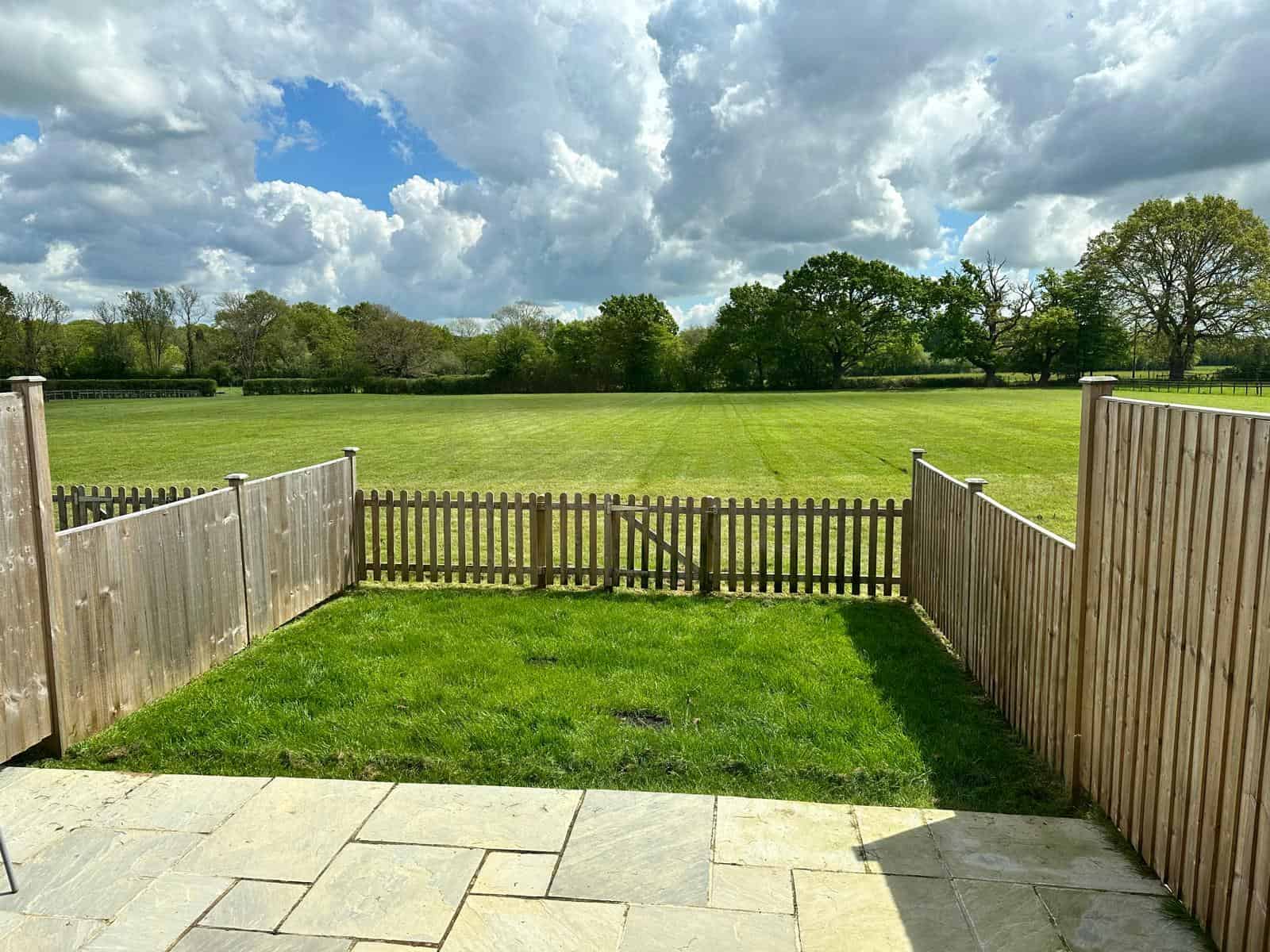 Private fenced garden beside the clinic
