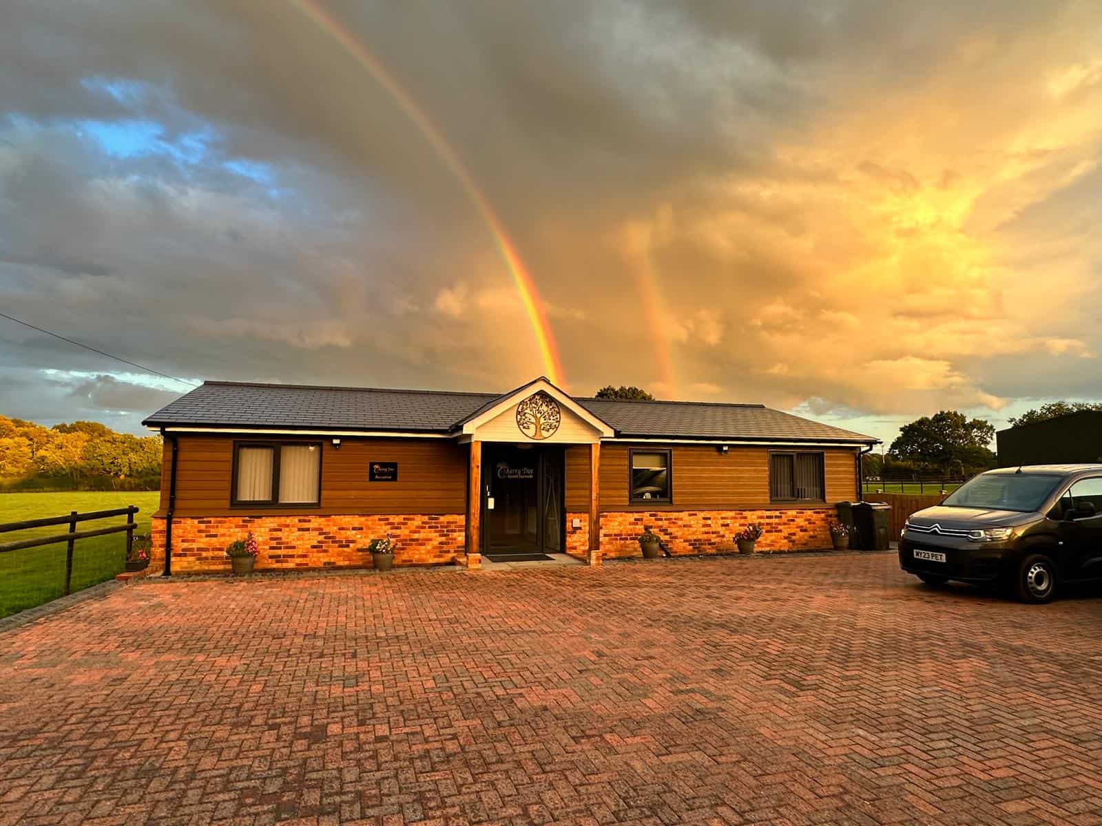 Clinic building beneath an evening sky